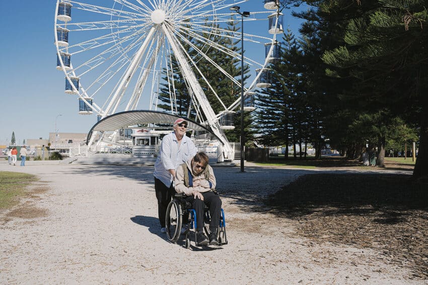 A support worker and participant enjoying a day out together